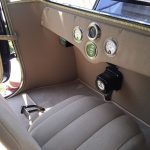 electric vehicle interior showing software dashboard display